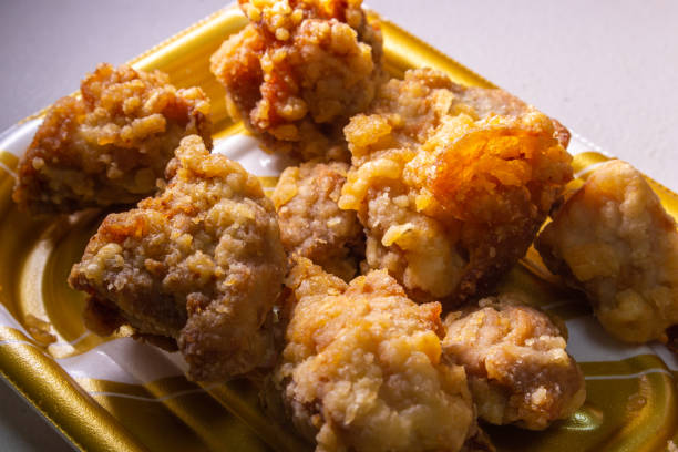 Closeup Japanese style deep fried chicken "Tori no Karaage" packed in plastic tray stock photo