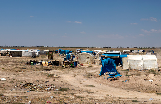 migrant tents, refugee camp. seasonal worker tents.