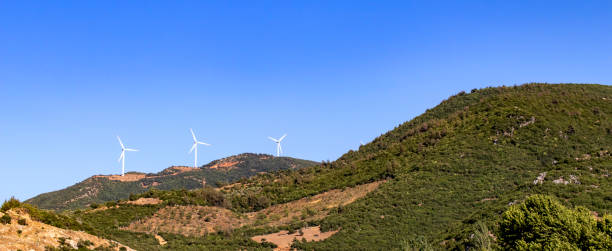 istock wind turbines in the plain in the hills. 1336660231