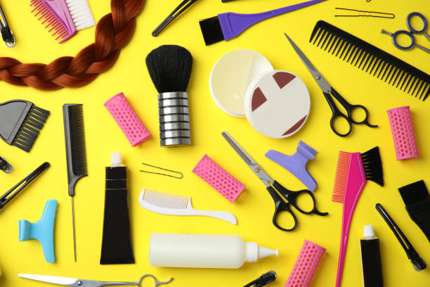 istock Professional tools for hair dyeing on yellow background, flat lay 1336662827