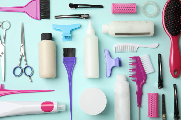 istock Professional tools for hair dyeing on light blue background, flat lay 1336662835