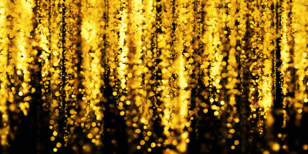 istock floating gold bokeh black background golden stardust 3D illustration 1336665325