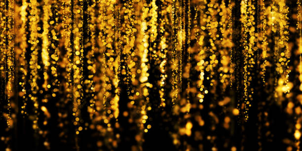 istock floating gold bokeh black background golden stardust 3D illustration 1336665338