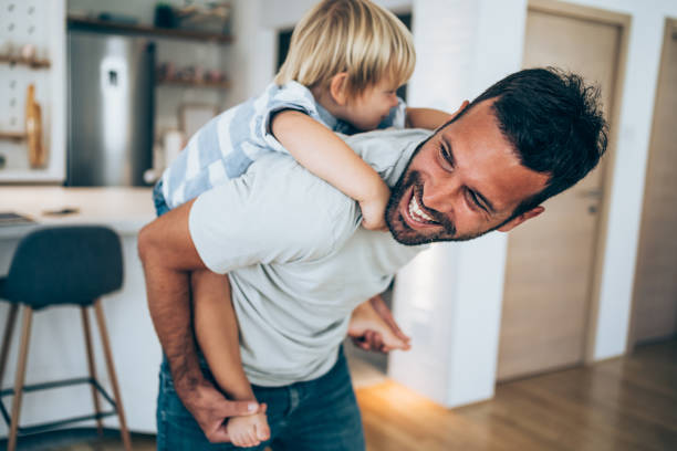 istock Father and little son at home. 1336668952
