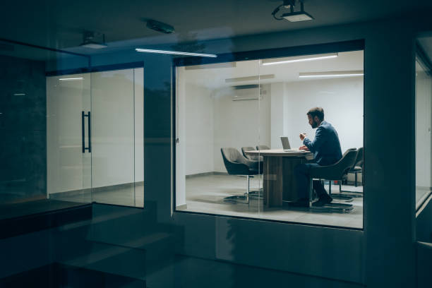 istock Businessman working late in the office. 1336668992