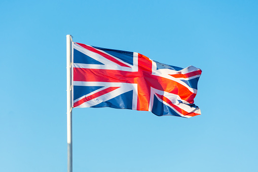 Flag on the blue sky, flag symbols of United Kingdom