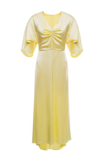 istock Yellow dress isolated in white background, invisible mannequin 1336674570
