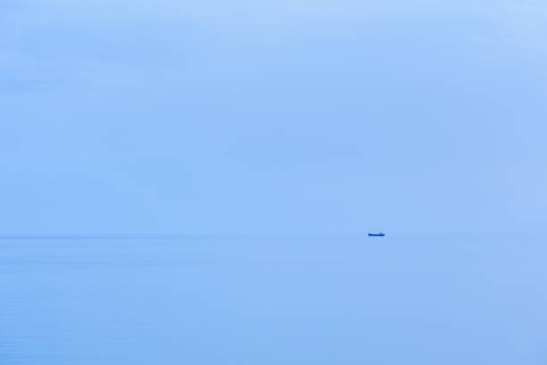 Relaxing sea with ships in the distance from drone