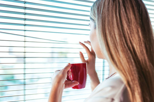 istock woman taking coffee break in office enjoying coffee 1336682494