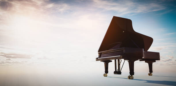 istock Grand piano on blue sky background 1336682795