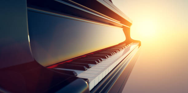 istock Grand piano keyboard on sunset sky 1336682797