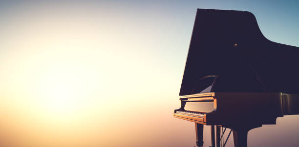 istock Grand piano keyboard on sunset sky 1336682910