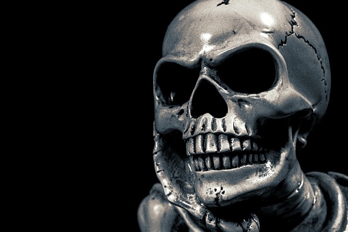 shiny metallic skull isolated on white background