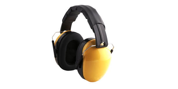 Earmuff or ear protector for workers Ear protectors or earmuffs to protect the eardrum from noise when working in noisy places, such as in factories, studios, planes, helicopters, pilots, airports ear protectors stock pictures, royalty-free photos & images