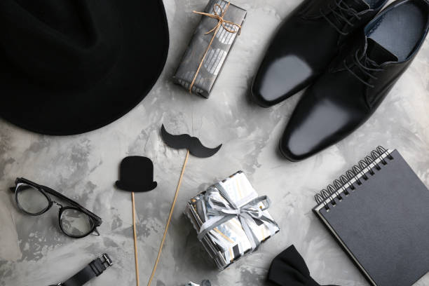 istock Flat lay composition male accessories and gift boxes on light grey stone background. Happy Father's day 1336689245