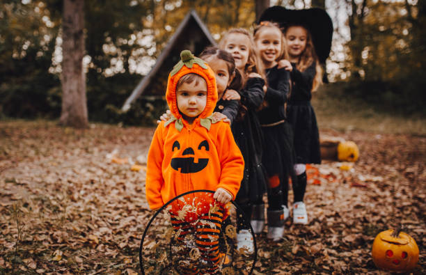 istock Children play in the woods on Halloween 1336689390