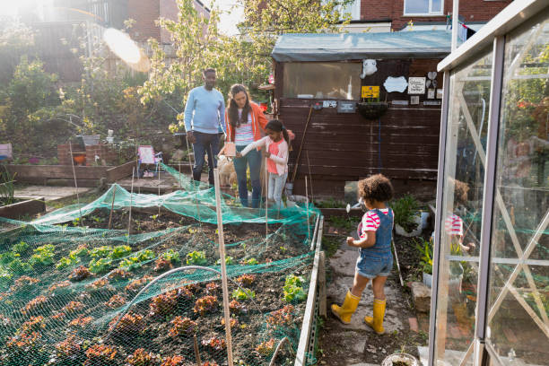 nos encanta la asignación - green thumb refrán en inglés fotografías e imágenes de stock