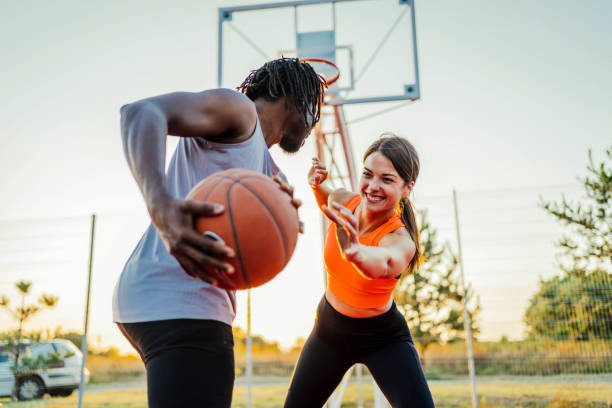 istock Couple playing basketball 1336691019
