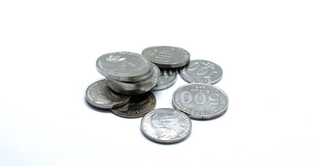 istock Rupiah coins, silver Indonesian money 1336692424