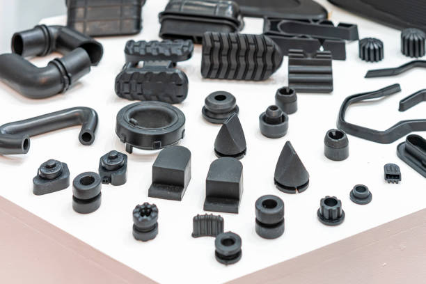 Various compression molded rubber sample parts made from manufacturing process in industrial e.g. plug cover cap pipe tube pedal nozzle connector and automobile parts other stock photo