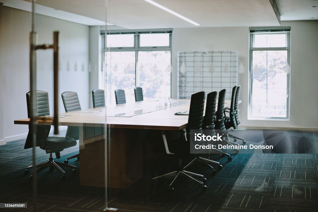 Shot of an empty boardroom at work This is where the magic of business happens Board Room Stock Photo