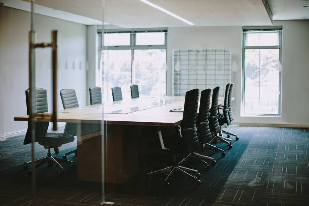 shot of an empty boardroom at work - board meeting bildbanksfoton och bilder