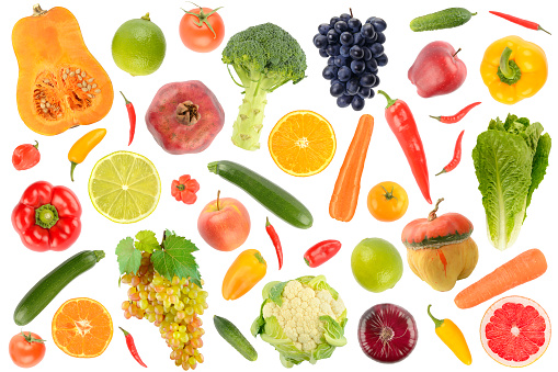 Abstract pattern. Large collection of fresh vegetables and fruits isolated on white background.