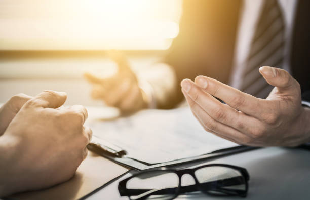 istock Business people negotiating a contract. 1336699761