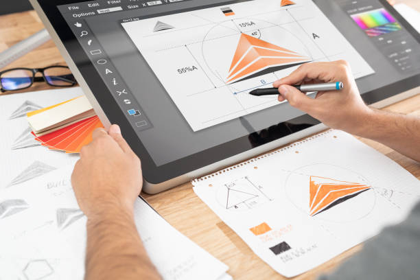 istock Graphic designer drawing sketches logo design. 1336700777