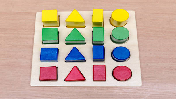 istock Multicolored wooden board game for puzzle solving for children 1336701872