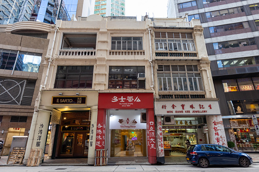 Hong Kong - August 25, 2021 : IL Sarto, Yiu Fung Store and Mok Sang Kee Jewellery in 172-176 Queen's Road Central, Sheung Wan, Hong Kong.