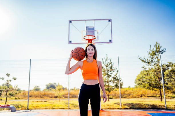 istock Woman with a basketball 1336703167