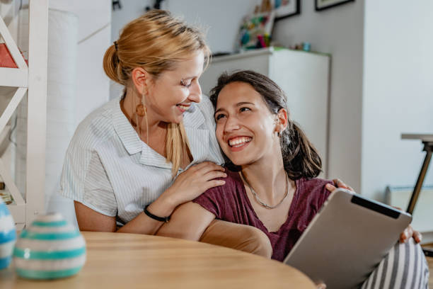 istock LGBT Lesbian couple at home is technology 1336708278