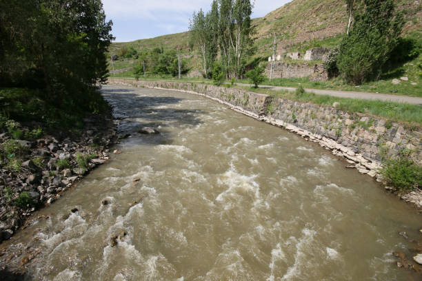 istock Kars Stream and the green nature around it, The stream flows dirty 1336709505