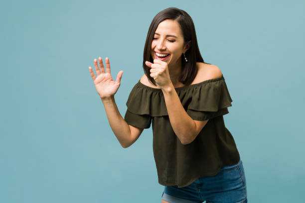 istock Young woman enjoying some music 1336713131