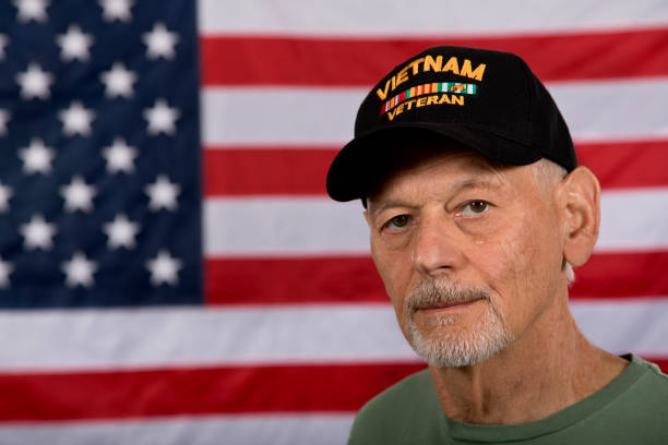 istock Vietnam Veteran with tear looking at camera with disgusted look 1336713989