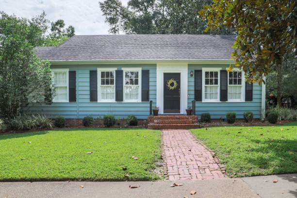 istock A revently renovated blue small cottage style house 1336714134