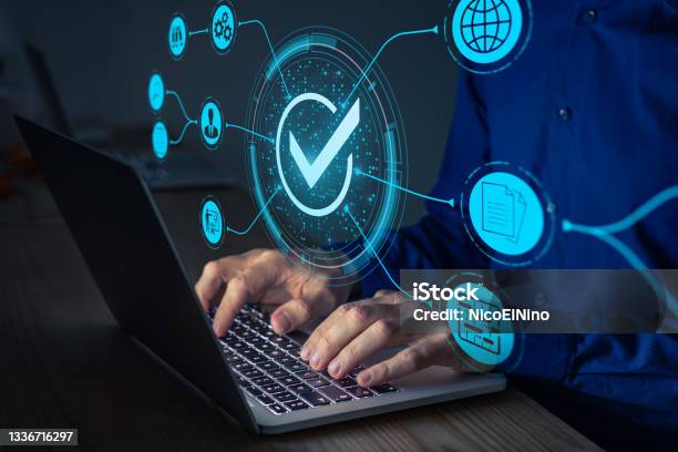 Quality Assurance And Certification Certified Internet Businesses And Services Compliance To International Standards And Regulations Concept With Consultant In Qa Management Working On Computer Stock Photo - Download Image Now
