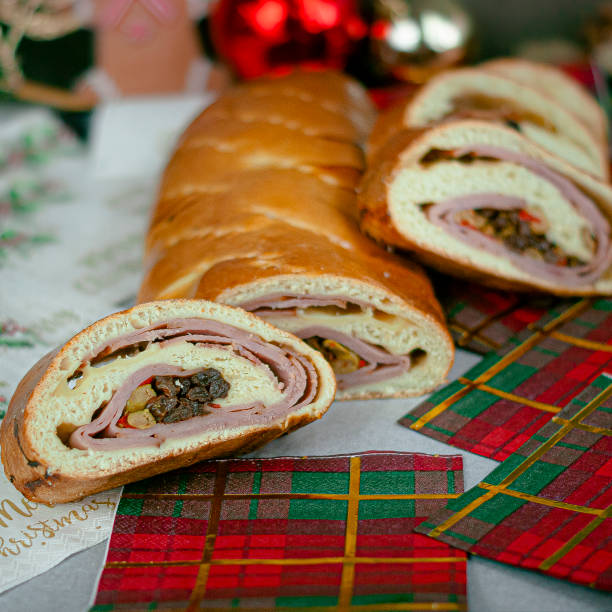 Delicious ham bread for this Christmas Ham bread is a bread stuffed with ham, fried bacon, raisins and green olives, usually stuffed with pepper or red paprika. It is a typical bread of Venezuela comerica park photos stock pictures, royalty-free photos & images