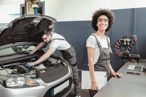 istock Female Mechanic Smiling at Camera 1336720630