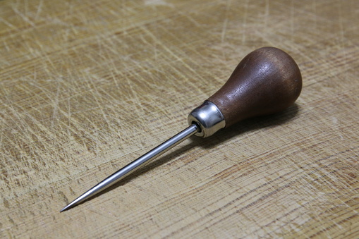 Awl - Reamer with wooden handle on table