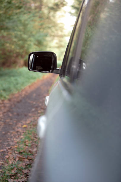 istock car close up at forest trail 1336724257