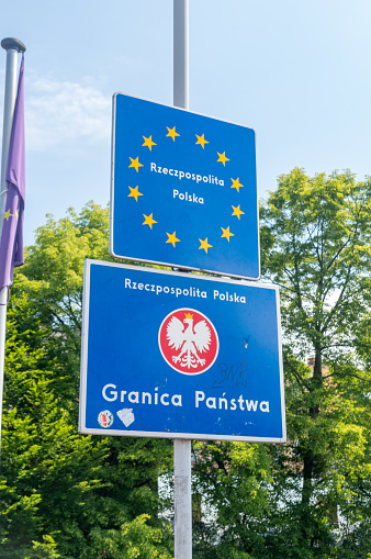 Cieszyn, Poland - June 5, 2021: Republic of Poland border signs inform about Europe Union and Polish border on border between Czech Republic and Poland.