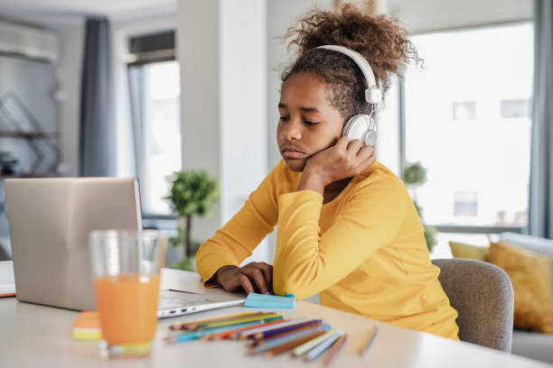 istock Girl feeling bored while listening to online class 1336726828