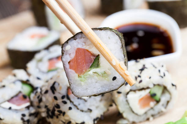 istock sushi made from white rice, trout and avocado 1336728163