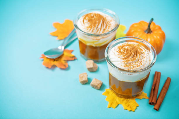 istock Pumpkin spiced Latte Coffee with whipped cream in a glass 1336729713