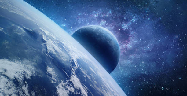 istock Planets in deep space. Earth and satellite. Sci-fi space wallpaper. Orbit of planet. Elements of this image furnished by NASA. 1336731077