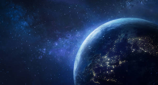 istock Earth planet at night in deep dark space. City lights. Blue Earth surface. View from spaceship. Elements of this image furnished by NASA. 1336731082