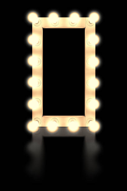istock Vintage white mirror frame with glowing lamps, isolated on black background. Make-up mirror with built-in lamps. Professional luminous mirror with reflection. 1336734517