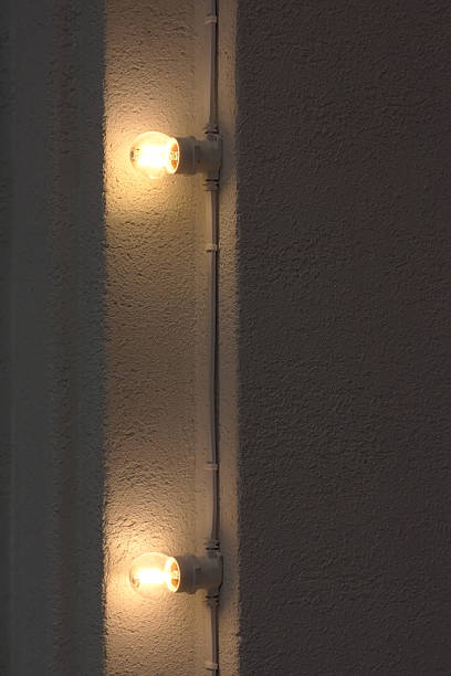 istock Two bright lamps in the wall niche 1336742101